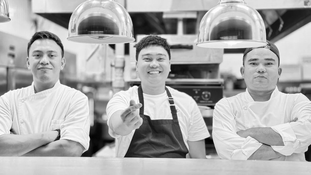Three chefs together in the Mr. Kim kitchen